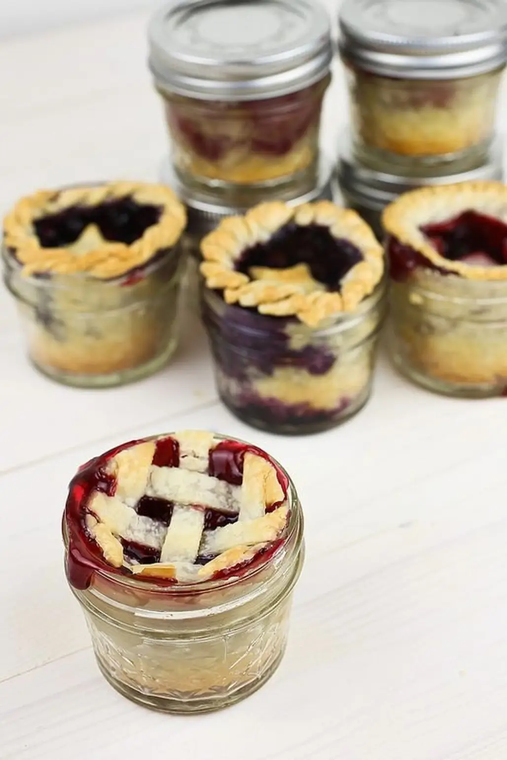 Patriotic Pies in a Jar with Cherry, Blueberry and Blackberry Fillings