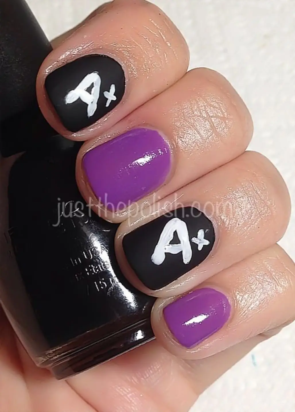 nail polish,finger,nail care,purple,nail,