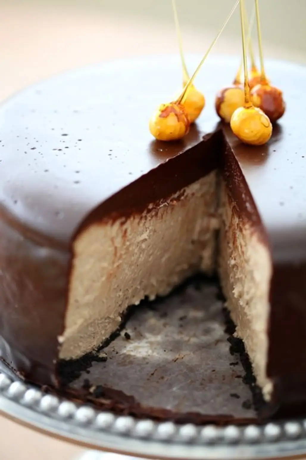 Chocolate Glazed Praline Cheesecake