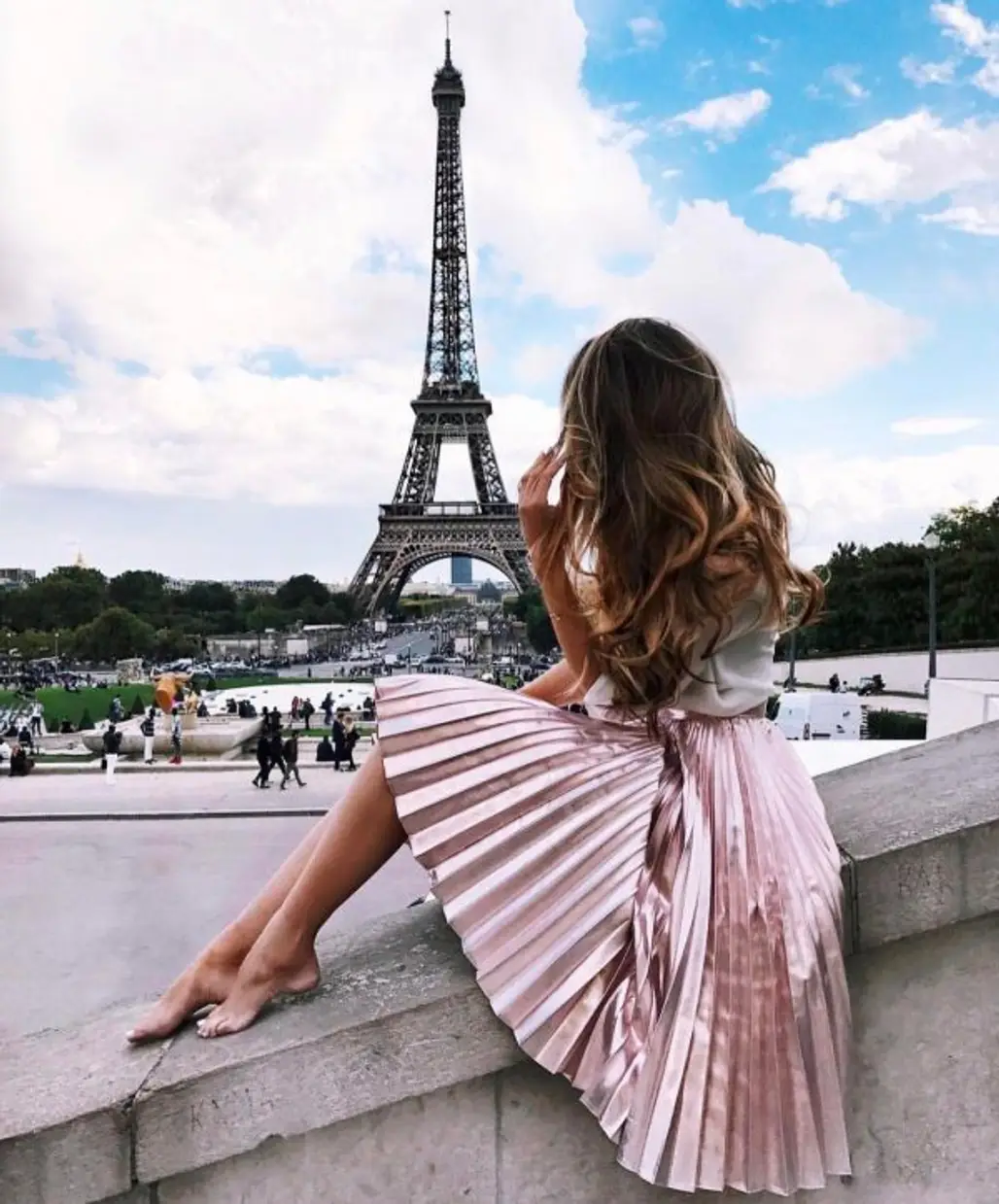 Eiffel Tower, photograph, human positions, image, sitting,