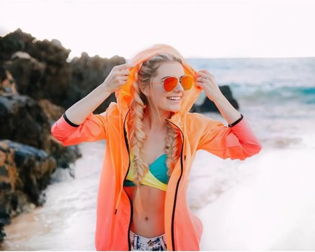 clothing, orange, costume, outerwear, personal flotation device,
