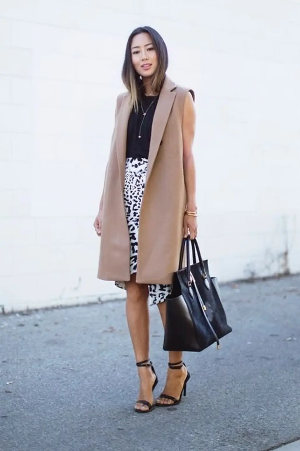 Bare Your Arms in Sleeveless Outerwear, like This Gorgeous Coat