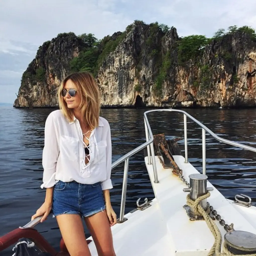 A White Top and Denim Cutoffs Are Perfect for a Picturesque Vacation