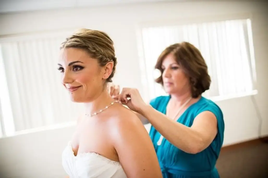 Mom Helping Bride Get Ready
