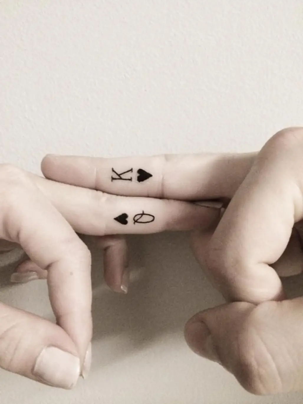 Machine Gun Kelly and Megan Fox debut matching finger tattoos