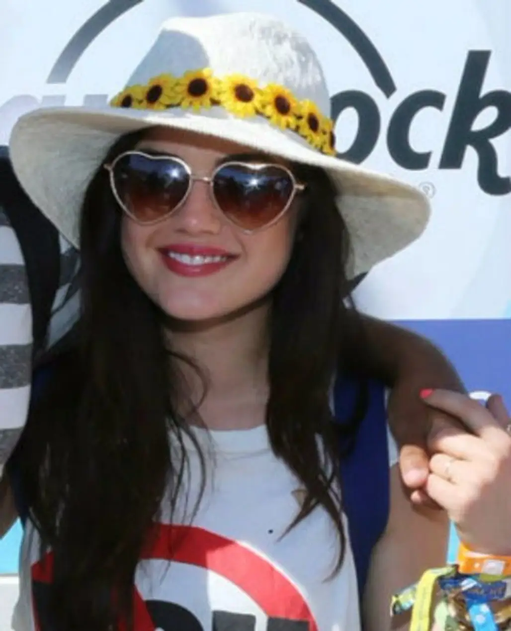 Lucy Hale Looks Super-cute in a Hat and Heart Sunnies