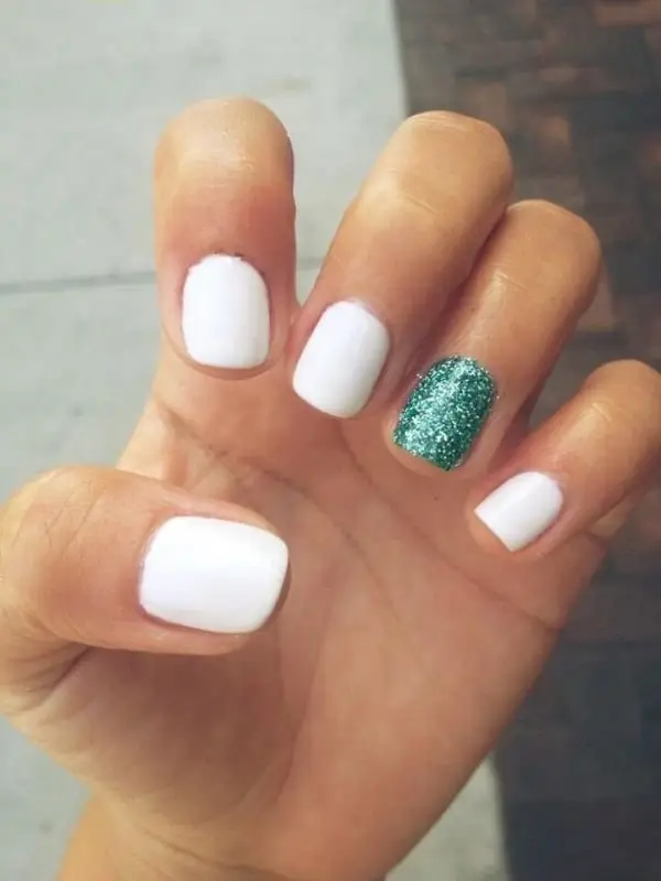 Hi Nails I - WHITE MANICURE WITH GLITTER 🙌 Since its introduction, white  nails paint has always fascinated the ladies. The colour goes well  synchronized with sharp edged nails; but experimenting silver #
