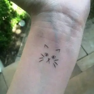 tattoo,skin,arm,finger,hand,