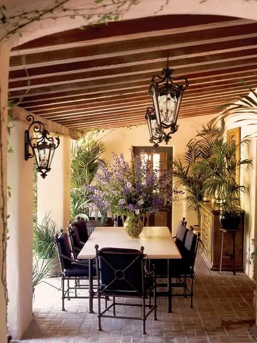 Make Your Outdoor Dining Room Pop with a Huge Vase of Flowers