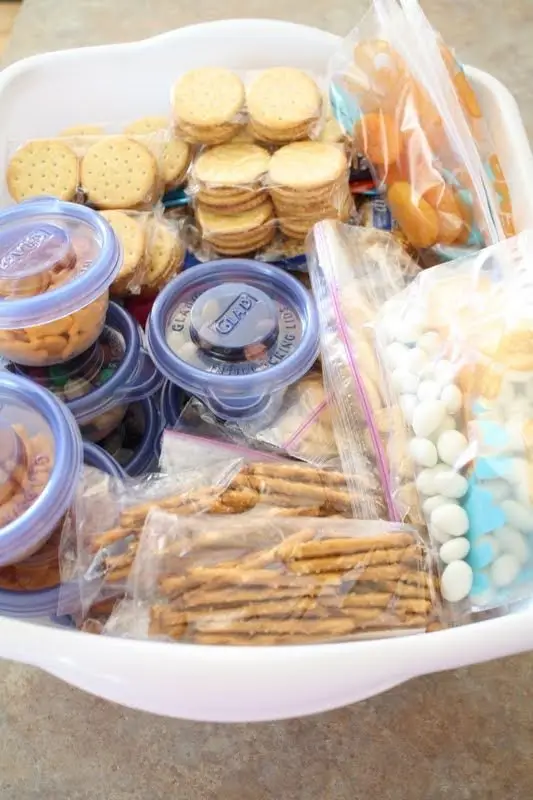 Road trip idea for toddler- tackle box with snacks Road trip food