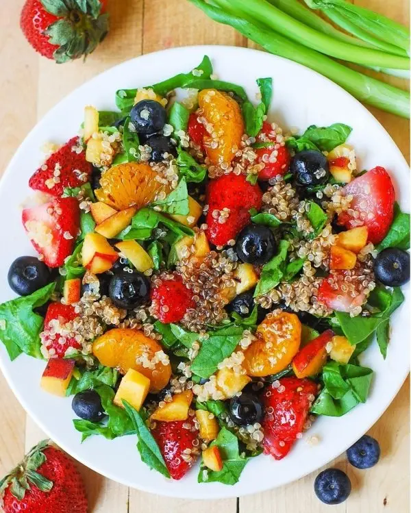 Quinoa Salad with Spinach, Strawberries, Blueberries, and Peaches, in a Homemade Balsamic Vinaigrette Dressing