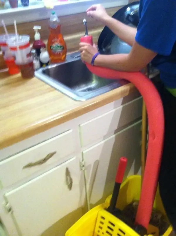 Use a Swimming Pool Noodle to Fill the Mop Bucket