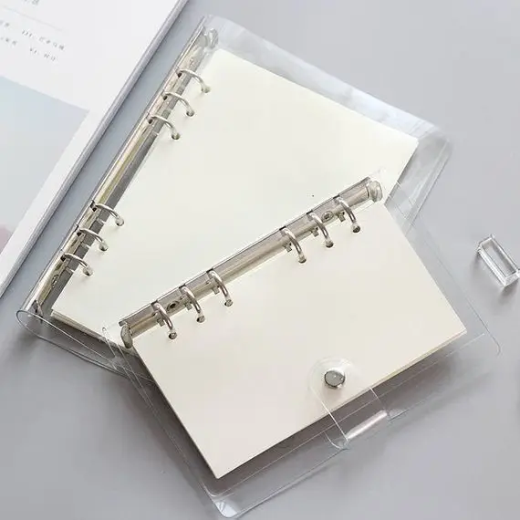 Font, Paper product, Ring binder, Metal, Notebook,