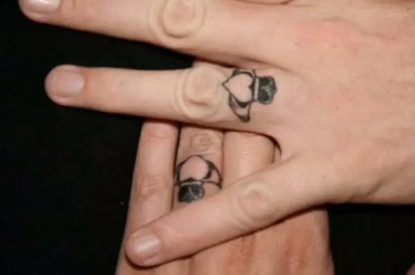 claddagh ring finger tattoo