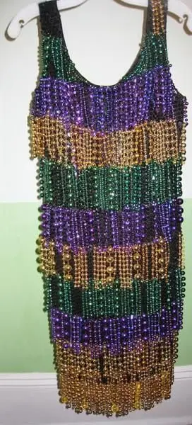 17 Cool Things to do with Your Mardi Gras Beads   Mardi gras beads,  Mardi gras wreath, Mardi gras diy