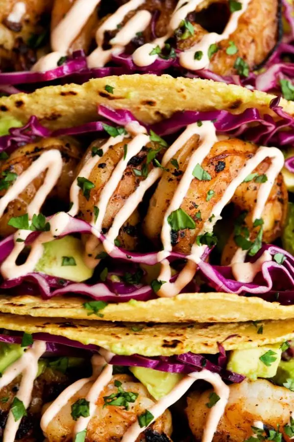 Honey Lime Tequila Shrimp Tacos with Avocado, Purple Slaw and Chipotle Crema