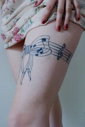 tattoo,arm,finger,leg,hand,