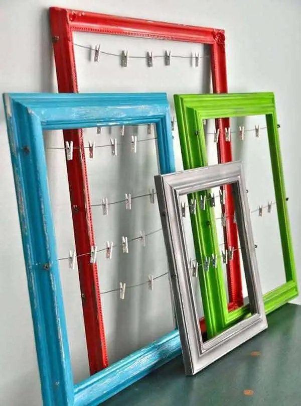 Picture Frames with Wire Strung across and Tiny Clothes Pins